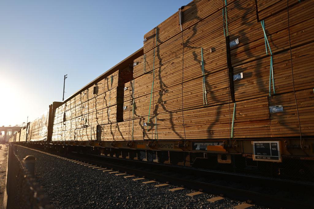 Stacks of lumber surrounding a sawmill campus